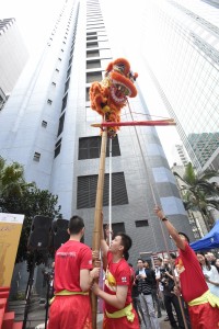 Lion Dance Performance - Reach for the sky on pillar